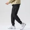 Jeans da uomo in stile giapponese semplici pantaloni larghi piccoli piedi a vita media alla moda e versatili274d