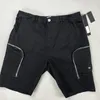 Pantalones cortos casuales de verano para hombres Monos de ejercicio relajados Pantalones de playa con insignia Ropa para correr de moda bra289i europea y americana