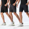 Pantaloncini da corsa con tasche con cerniera Uomo 2021 Estate Pantaloni a cinque punti traspiranti e ad asciugatura rapida Fitness Training Sport