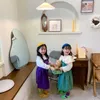 Toptan Kore Tarzı Bahar Kız Elbise Sling Katı Renk Nakış Çiçek Prenses Elbiseler Çocuk Giysileri E678 210610
