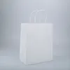 26 * 12 * 33 cm Borsa da imballaggio in carta kraft colorata per la vendita al dettaglio Multi-colori Bomboniere Confezione regalo Borse con due manici nella parte superiore