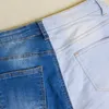 Kvinnors jeans kvinnors fashionabla kontrastfärg kvinnor avslappnad smal fit höst lapptäcke stretch hål blyerts personlighet byxor femme