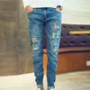 最高品質の2021ファッションリッピング穴の穴の穴の穴のある青いジーンズパンツ男性バギーハリムジーンズティーンエイジャーデニムカウボーイズズボンx0621