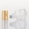 エッセンシャルオイルのための8mlのガラスローラーボトル、ステンレス鋼のローラーボール、ゴールドアルミニウムキャップのロールオンバイアルアロマテラピー香水コンテナ
