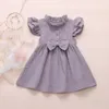 Nouveau 2020 Enfant Enfants Bébé Filles Été Solide Lin Bouton À Volants Manches Courtes Mignon Arc Princesse Robe Robe De Soirée Q0716