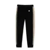 Pantalons pour hommes Designer Mode Hommes Pantalons Hip Hop Fitness Streetwear Pantalon Casual Printemps Automne Sport Élastique Mâle Pantalon Léger Respirant 3MXI