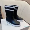 Botte de pluie imprimée antidérapante pour femmes, demi-bottes plates en caoutchouc naturel, top de styliste, printemps-automne, boîte de chaussures pour dames, taille 35-40