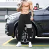 ファッションカジュアルスウェットパンツ男性のズボンのテーパーの弾性ジョガーを実行しているトレーニングトラック衣料品