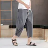 Pantaloni da uomo estivi stile cinese casual in lino capris sottili pantaloncini larghi in cotone con tendenza harem da spiaggia