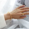 2021 nuove signore stile francese bambù bracciale aperto design senso acciaio al titanio gioielli di lusso luce dorata non sbiadisce Q0717
