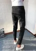 Jeans pour hommes automne et hiver 2022 mode mince petit pantalon de pied shopping harlan groupé denim tout-match