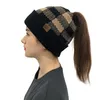 New style ladies plaid ponytail woolen CC cap, fashionable European and American curled edge warm knitting warm earmuff head hat