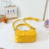 Fashion Girl Handväskor Nylon Plain Color One-Axel Väskor Barn Söt Brev Casual Portable Messenger Bag Tillbehör 7 Färger