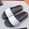 134w senaste högkvalitativa män Design kvinnor Flip flops Tofflor Mode Läder slides sandaler Dam Casual skor