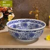 Bassin d'art chinois antique classique, lotus emmêlé en porcelaine bleue et blanche au-dessus du comptoir