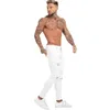 GINGTTO Jeans skinny hip-hop bianchi ad alta elasticità Pantaloni elastici in vita per uomo Taglie forti Silm Fit