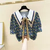 Drukowane Peter Pan Collar Lace-Up Print Bow Krótki Koszula Kobiety Lato Luźne Starzenie All-Match Design Tops Kobiety Bluzki 210615