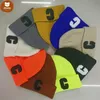 Berretti invernali unisex Cappello lavorato a maglia a costine Lettera C Berretto con risvolto Solido Amanti Lana Cappelli lavorati a maglia all'uncinetto Ragazzi Ragazze Sport all'aria aperta Polsino Berretto con teschio 591w