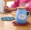 Mata silikonowa Hollow Coaster Izolacja Maty Kubek Hexagon Pad Podkładka ciepła Miska Home Decor Desktop Platemat JJA9584