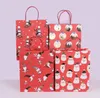 Grande regalo per la festa di Natale Sacchetti di carta Kraft Creativo rosso Simpatico cartone animato Confezione natalizia Tote Bag Regali per festival Confezione-borsa SN3043