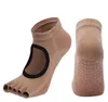 Hot 2021 Hälfte fünf Finger Baumwolle Peep Toe Yoga Socken Rutschfeste Offene Zehen Pilates Knöchelgriff Durable Anti-Rutsch Silikon Pilates Socke Backless Frauen Gym Fitness Sox