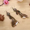 Rond rétro femmes attrape-rêves à la main Long gland plume boucles d'oreilles femme en bois perle balancent boucle d'oreille Boho bijoux