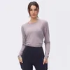 Top sportivo a maniche lunghe da donna Abiti da yoga Indossa biforcazione Bella schiena Abbigliamento sportivo Moda T-shirt traspirante Top T-shirt