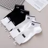 Femmes hommes lettre coton chaussettes noir blanc décontracté respirant cheville chaussette avec étiquette cadeau pour amour ami entier 2612471