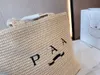 2021 P 쇼핑 재사용 가능한 가방 패션 짚 짠 직물 다목적 스타일 기질 고급 제품 레저 여행 25552223R