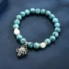 Bärade trådar Lysande naturliga stenar som glödar i det mörka armbandet Lotus Flower Shaped Charm för kvinnor Yoga Buddhism smycken Trum22