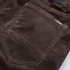 Pantaloni casual elasticizzati in velluto a coste spesso da uomo autunno Pantaloni slim kaki stile classico Abbigliamento maschile di marca 211112