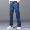 Calça jeans de cintura alta masculina em linha reta tamanho grande calças de jantar masculino macho jeans preto lado multi bolso azul solto elástico bandeja calças de carga 210518