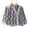 Suéter de mujer Diseñador con cuello en V de cuello en V y otoño Cardigan Rayado en celosía suelto clásico de alta calidad moda mujer suéteres