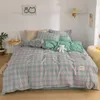 Bedding Define Creme Japonês Creme xadrez de quatro peças Lavagem de menina para lavar a colcha fofa Têxtil caseira de três peças