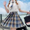 Юбки красная готическая плиссированная женщина Японская школьная форма с высокой талией сексуальная милая мини -юбка для мини -клетки JK Одежда студентов