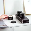 black candle tins