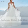 Lakshmigown Flowy Beyaz Gelin Robe Plaj Elbise Spaghett Kayış Yaz 2021 Seksi Ruffles Tül Gelinlikler Dalma
