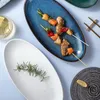 Plats plaques céramique japonais poisson assiette créative personnalité simple personnalité ménage végétal profonde ovale sushi micro-ondes PLA cuite à la vapeur