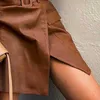 Printemps marron irrégulière en cuir PU femmes jupe taille haute ceinture fendue femme jupes solide Streetwear tout match décontracté dame bas 210629