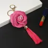 10 Teile/los Leder Kamelie Blume Weibliche Schlüsselbund Tasche Plüsch Auto Schlüssel Ring Echte Rose Blumen Lange Quaste Stil Schlüssel Kette