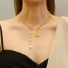 pearl and coin necklace