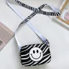 Luxo crianças zebra listra bolsa INS crianças sorriso impresso um ombro sacos Meninas carta saco do mensageiro A80288398710