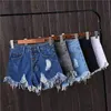 Pantaloncini di jeans a vita alta sexy femminili coreani BF Summer Wind Pantaloni jeans larghi con foro svasato indossati dalle donne 210719