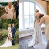 2021 Robes de mariée country en dentelle à manches longues robe nuptiale des boutons recouverts de cou feston de cou de balayage appliqués sur mesure