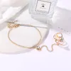 Charms a catena a maglie Regali di San Valentino Pietre preziose intarsiate Bracciale a doppia freccia con anello Donna Gioielli da sposa in cristallo oro rosa Fawn22