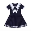 Letnia poliestrowa sukienka dla dziewcząt Koreańska wersja w stylu college'u granatowe lapowe plisowane spódnice swobodne dzieci039s clothin5358325
