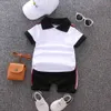 Set di vestiti per neonato 2021 Summer Casual Cotton Kid Turn-down Top + Pantaloncini neri Abiti sportivi da golf a maniche corte per bambini