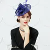 red fascinator hats