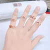 4 stks mode-sieraden ringen set hot selling metalen legering ronde vrouwen vinger ring willekeurige patroon meisje dame feest bruiloft geschenken G1125