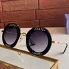 Gafas de sol de moda 0113S para mujer personalidad carta raya marco redondo gafas de sol mujeres fiesta casual alta calidad UV400 con mirro4121982